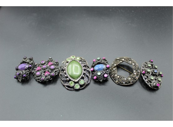 Six Assorted Colored Brooches (194)