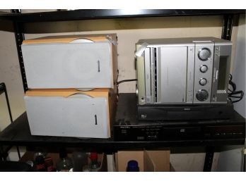 Assorted Electronics; Panasonic Stereo With Speakers, Rotel CD Player, RCA Digital Satellite Receiver (165)
