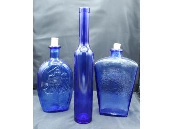 Three Dark Blue Glass Bottles (038)