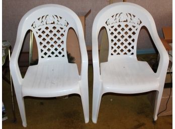Two Plastic Chairs 22' X 36' X 21' (R105)