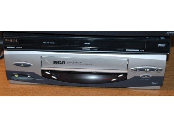 RCA VHS Player And Phillips DVD Player With Remotes. Phillips Serial# DVP3982/F7. RCA Serial# B143NL0Q5 (155)