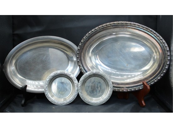 Silverplated Serving Platters, 2 Medium Oval And 2 Small Round. (060)