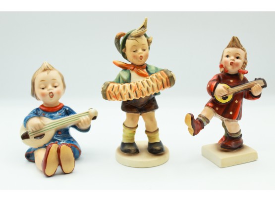 3 Hummel Figurines - Accordion Boy, Joyful Banjo, And Happiness Girl. (0159)