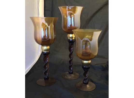 Three Gold Colored Stemmed Candle Holders (0994)