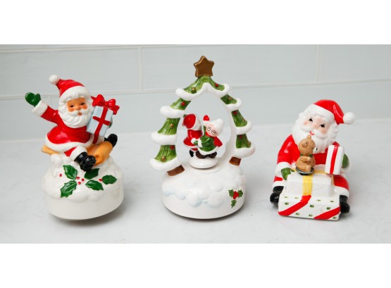 Lot Of 3 Ceramic Holiday Figurines - 2 Santa Statues And 1 Spinning Music Figurine  (2772)