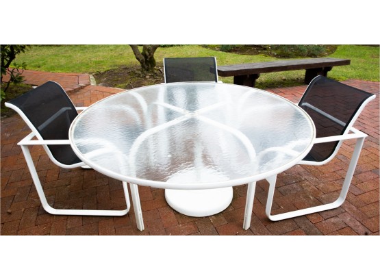 Brown Jordan Durable Round Patio Table With Glass Top And Three Black Chairs And Umbrella