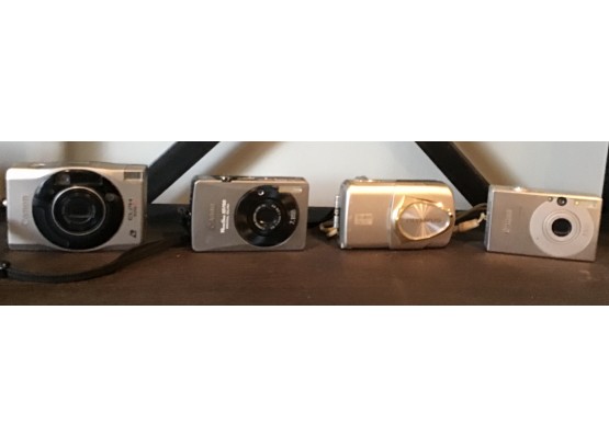 Assorted Digital Cameras Cannon PowerShot, Olympus Stylus, Canon Powershot, & Canon GLPH (G114)