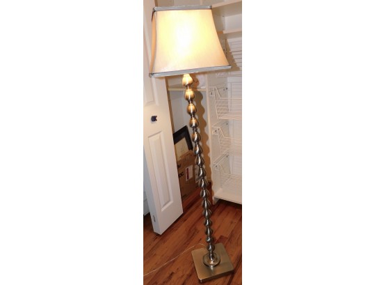Stylish Silver Toned Metallic Floor Lamp With Ivory Shade