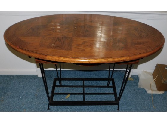 Oval Shaped Wood  Table With Wrought Iron Legs And Bottom Shelf