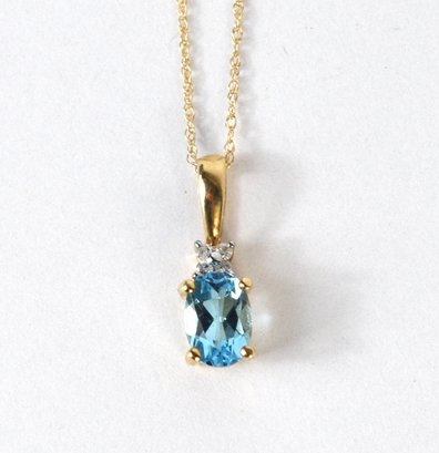 14K Gold Blue Topaz Woman's Necklace 16'