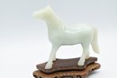White Jade Horse Carving On Wooden Base