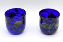 Gorgeous Hand Blown Double Layered Iridescent Art Glass Vase With A Pair Of Matching Blue Decorated Glasses