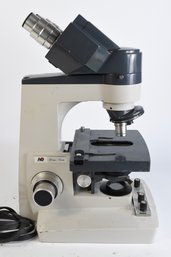 American Optical One-Ten Binocular Microscope With 1 Objective & Lamp