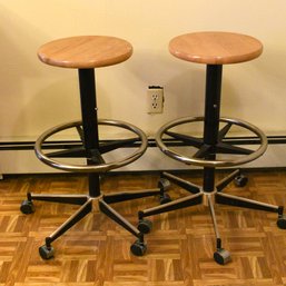 2 Wood Topped Rooling Stools