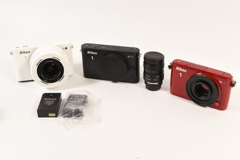 Nikon 1 Mirrorless Camera's J1 & S1 - 3 Total