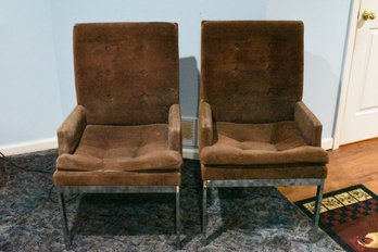 Pair Of Dark Colored Arm Chairs