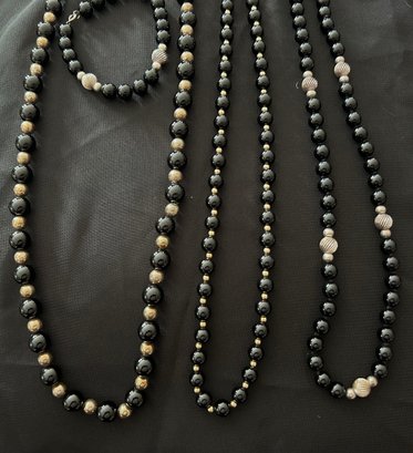 Three Black Beaded Necklaces One Bracelet