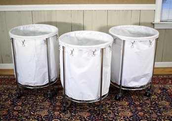 Three Large Canvas And Chrome Rolling Laundry Hampers (CTF20)