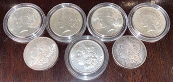 Seven American Silver Dollars (CTF10)
