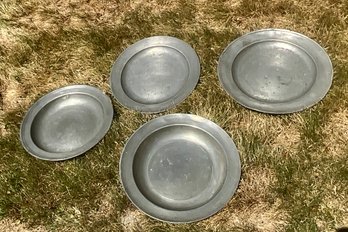 Four Vintage Pewter Chargers