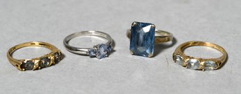 Four Gold, Platinum And Topaz Rings (CTF10)