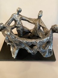 Metal Figural Sculpture On Wood Base