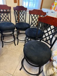 Four Counter Height Swivel Chairs