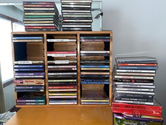 About 80 CDs And Display Holder