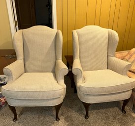 Pair Of Upholstered Wing Chairs