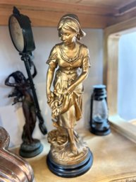 Peche Statue.  Fisher Girl