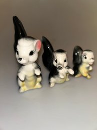 Vintage Japan Skunk Trio Figurines