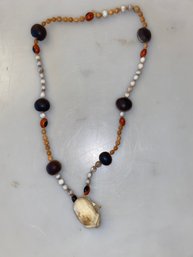 Monkey Skull Necklace With Cocoa Beads - Amazon