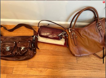 Lot Of Three Leather And Suede Handbags.
