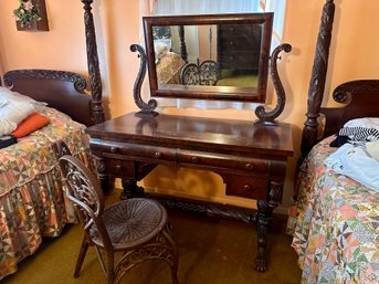 Antique Carved Mahogany Dressing Table With Mirror And Wicker Chair