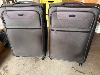 Two Large Spinner Suitcases