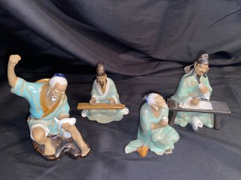 Chinese Mudmen Porcelain Figurines