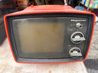 Vintage Orange Magnavox TV.