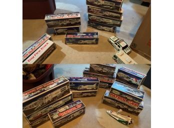 Large Lot NIB Hess Trucks