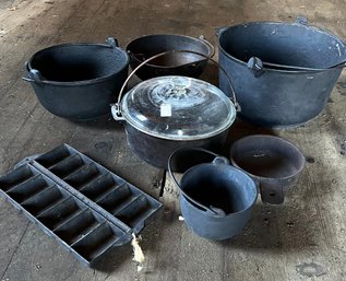 Lot Of Cast Iron Cookware Includes Wagner Dutch Oven With Glass Top And Marietta Marked Pot
