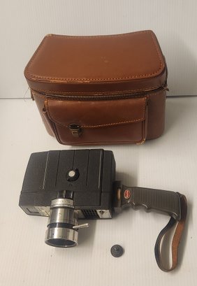 Bell And Howell Dual Electric Eye Handheld Movie Camera.