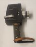 Bell And Howell Dual Electric Eye Handheld Movie Camera.