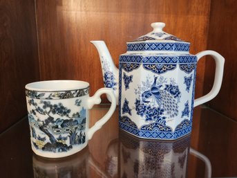 Porcelain Teapot And Matching Cup