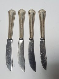 Four Sterling Silver Handled Knives