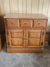 Maple Raised Panel Cabinet With Formica Top