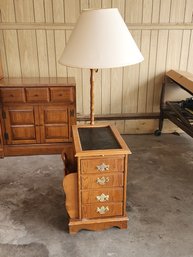 Wood And Oak Grained Particle Board End Table With Lamp And Magazine Rack.