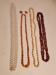 Necklace Lot Including Carved Bone And Amber