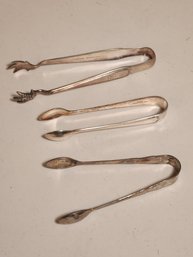 Three Pairs Of Silver Plated Sugar Tongs Including Holmes And Edwards And Engkish Sheffield