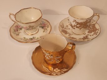 Three Demi Tasse Cups And Saucers