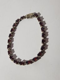 7' Sterling Silver And Garnet Braclet