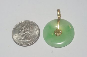 18 Karat Gold And Jade Pendant